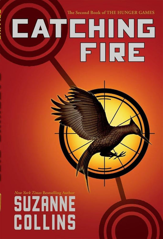 Catching Fire by Suzanne Collins - Paperback edition. 